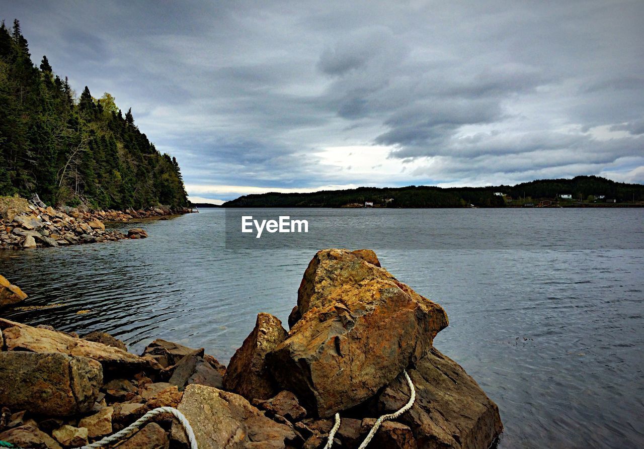 Scenic view of sea against cloudy sky