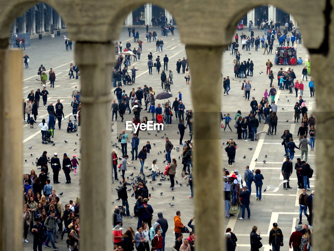 High angle view of people on city square 