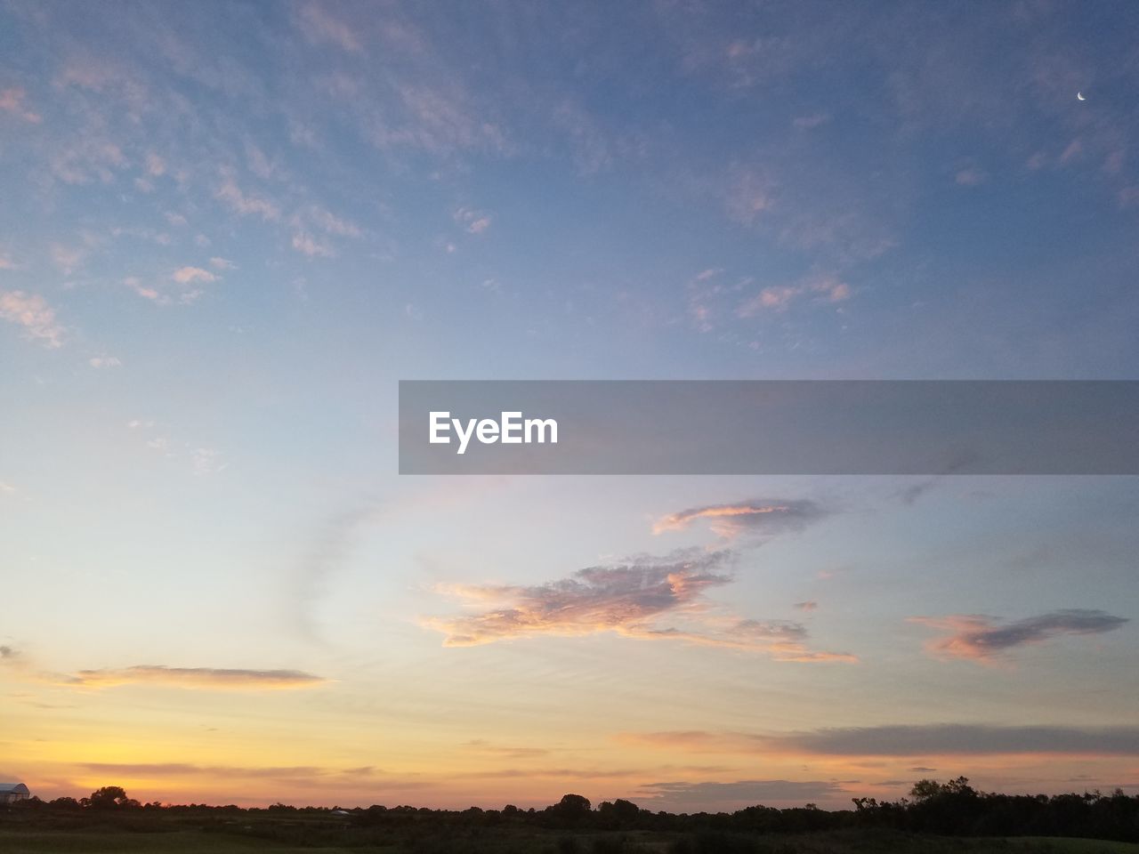 Low angle view of dramatic sky during sunset