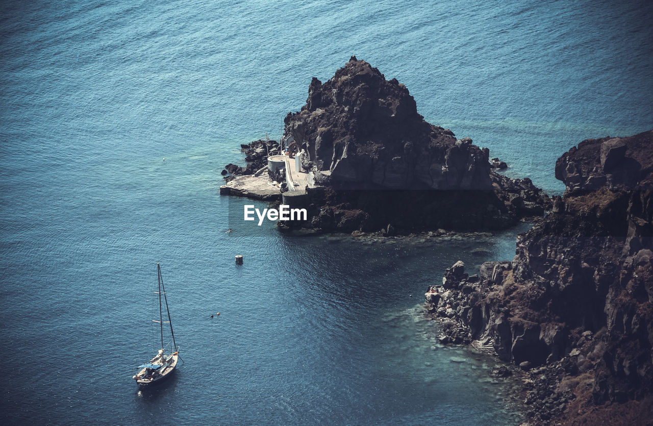 High angle view of rock formation in sea