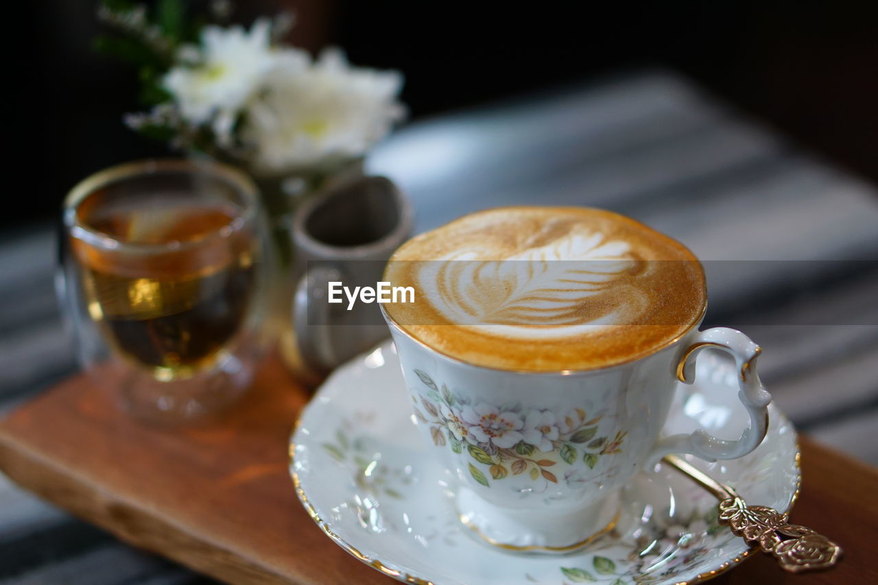 CLOSE-UP OF COFFEE CUP WITH TEA