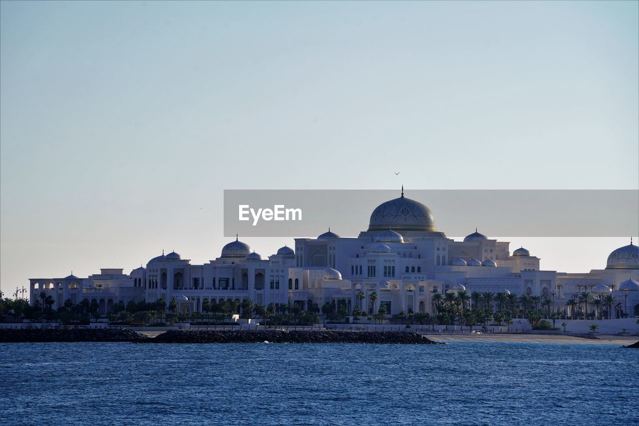 White marble palace at sunset time