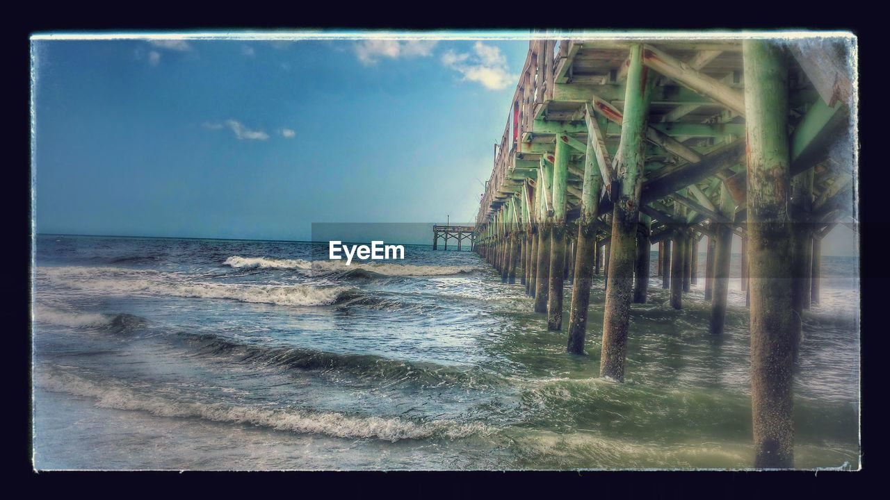 VIEW OF BEACH AGAINST SKY