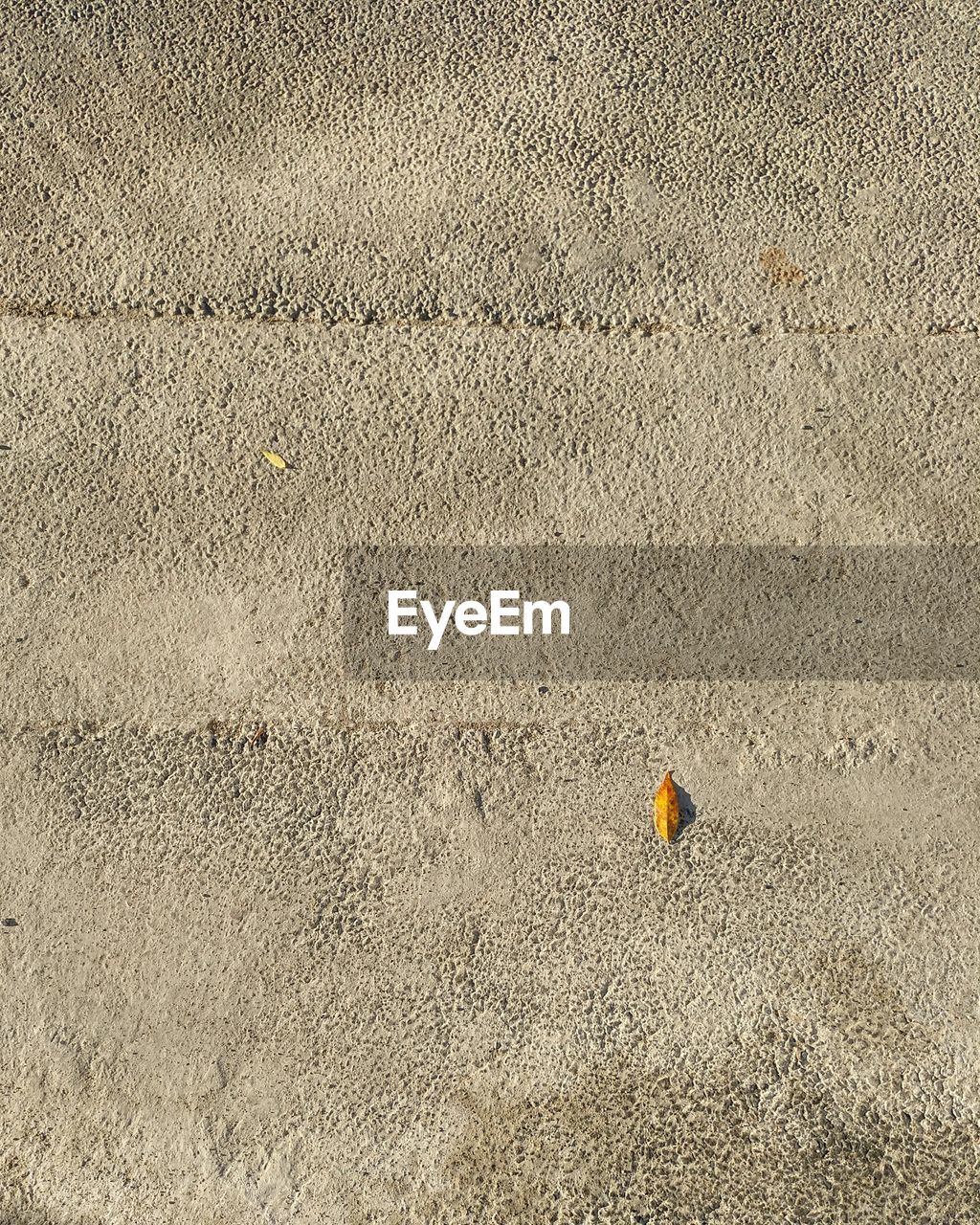 HIGH ANGLE VIEW OF SMALL SAND