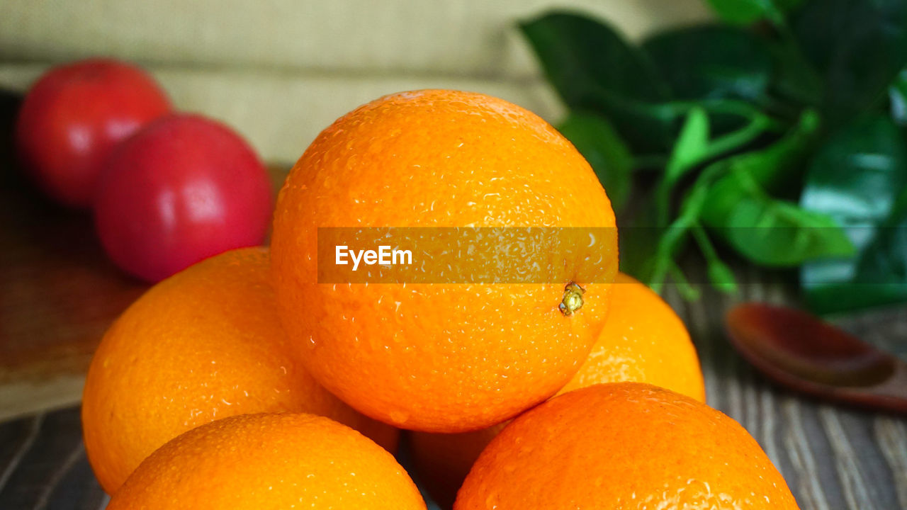 Close-up of orange fruits on table