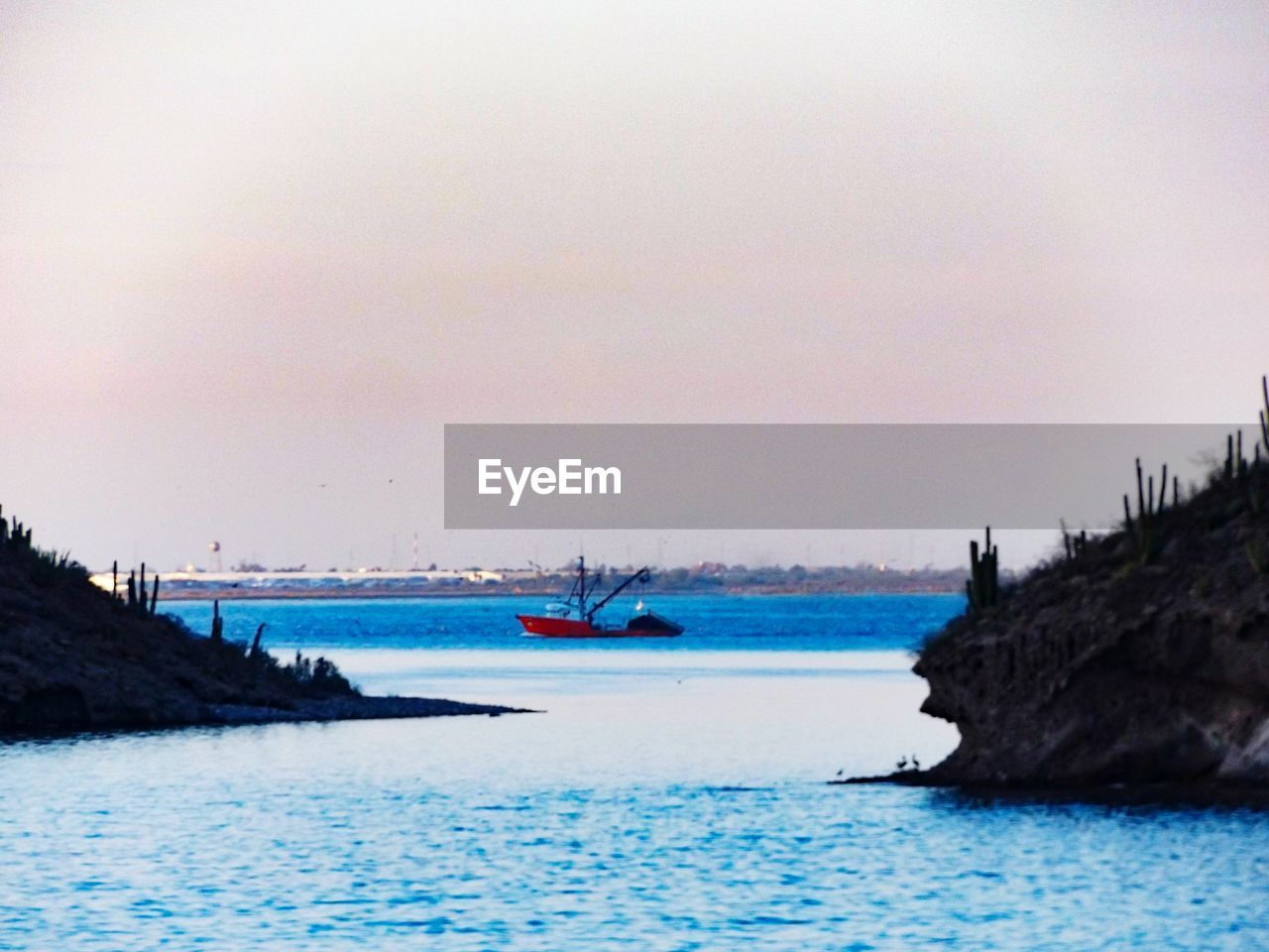 VIEW OF SEA AGAINST CLEAR SKY