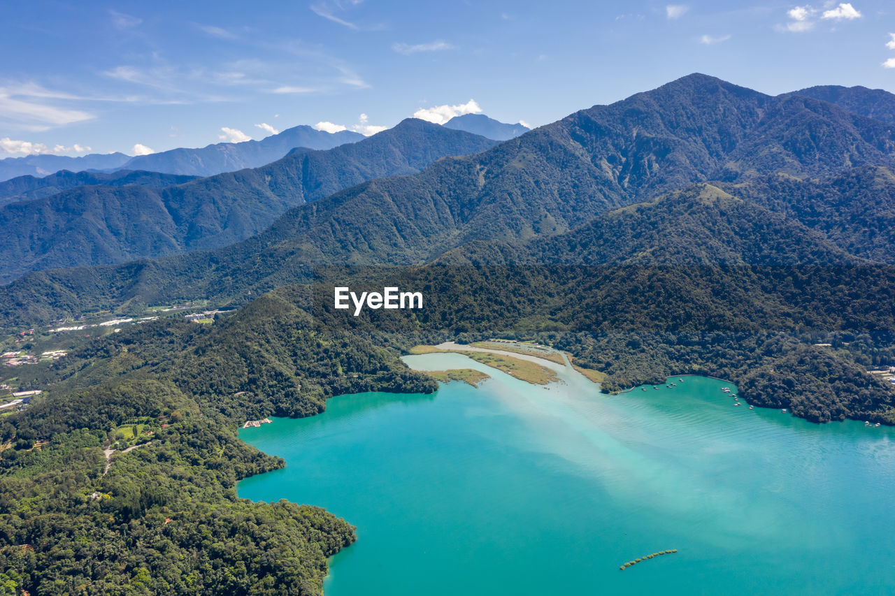 Aerial view of lake against mountain range