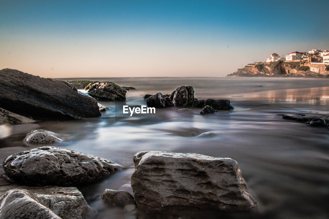 Scenic view of sea against clear sky