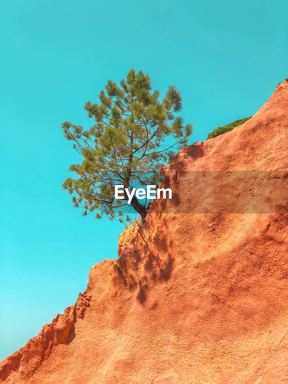 Low angle view of rock formation against sky