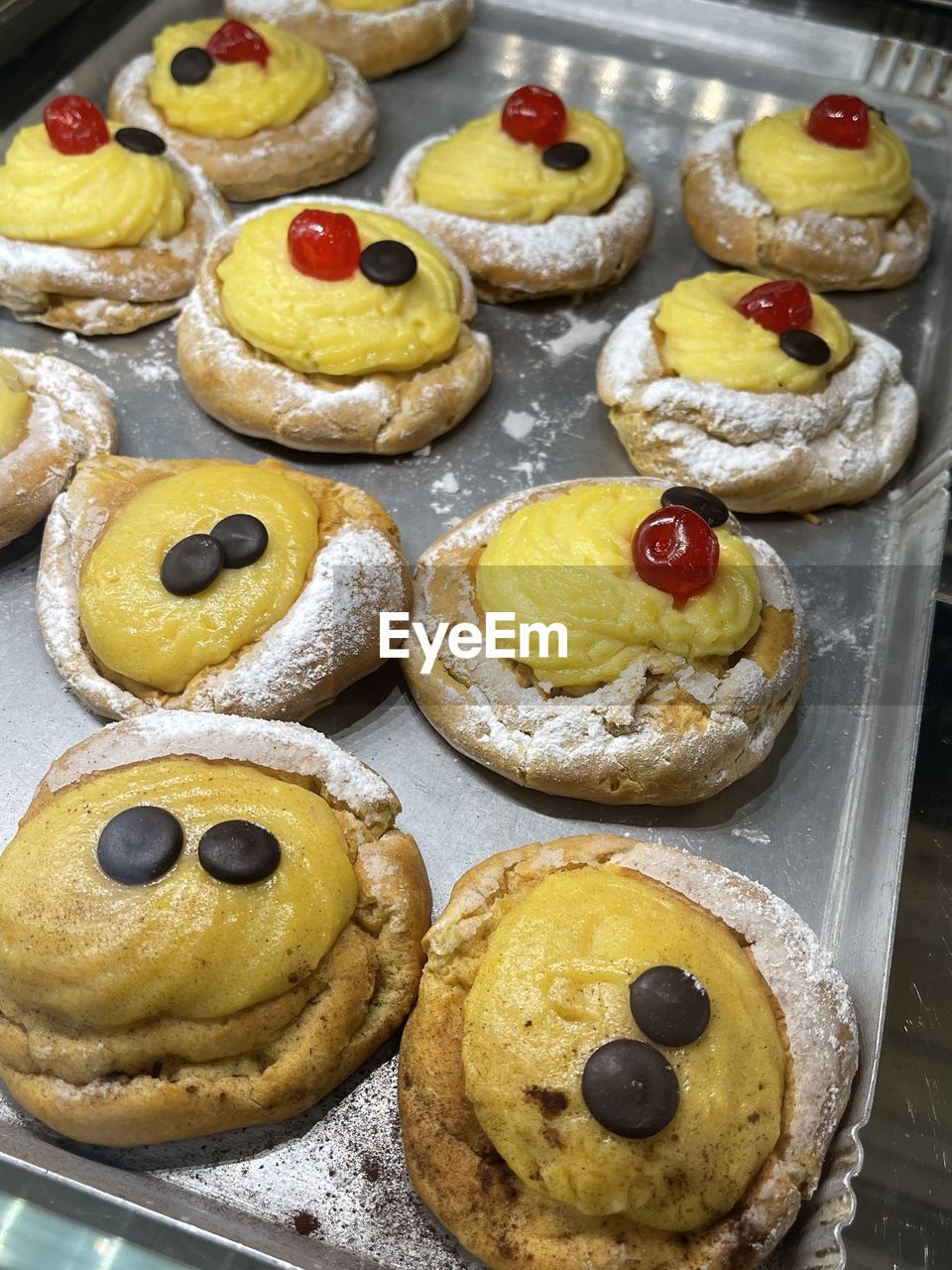 food, food and drink, freshness, sweet food, baked, high angle view, indoors, still life, dessert, produce, sweet, no people, temptation, dish, close-up, fruit, snack, unhealthy eating, tray