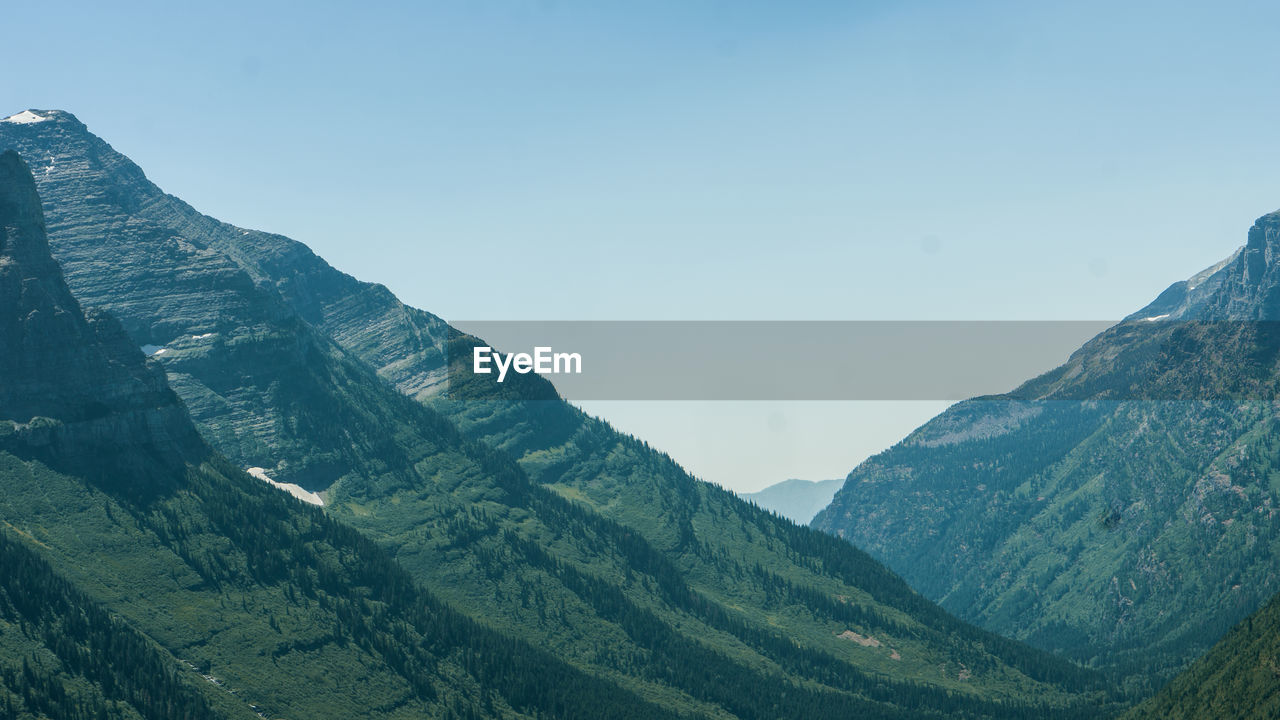 Scenic view of mountains against clear sky