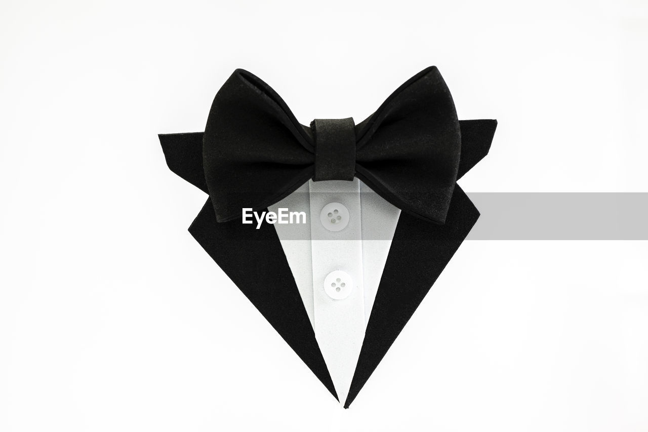 studio shot, bow, clothing, white background, black, no people, tied bow, bow tie, celebration, indoors, love, emotion, fashion accessory, ribbon, cut out, event