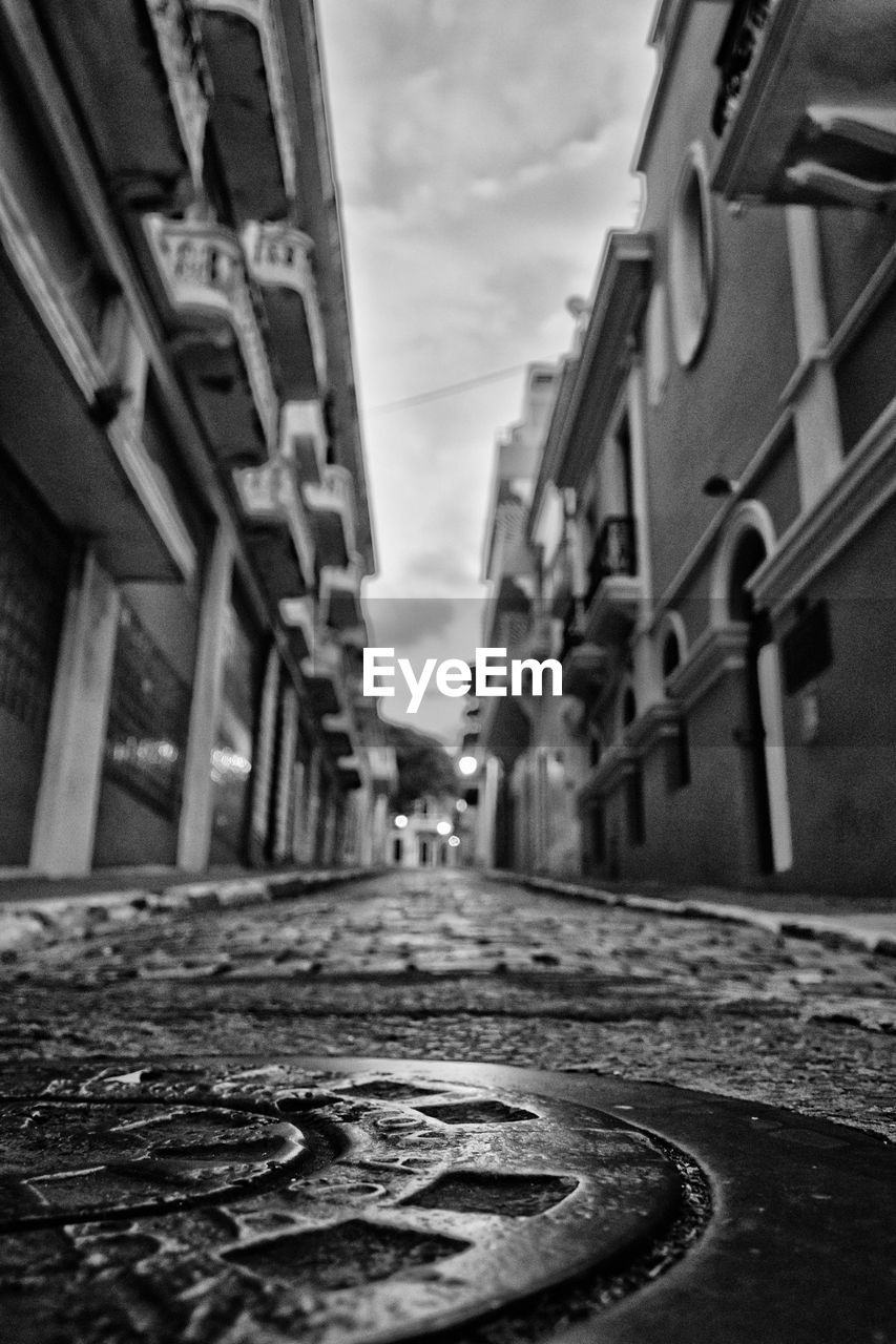 NARROW ROAD LEADING TOWARDS BUILDINGS