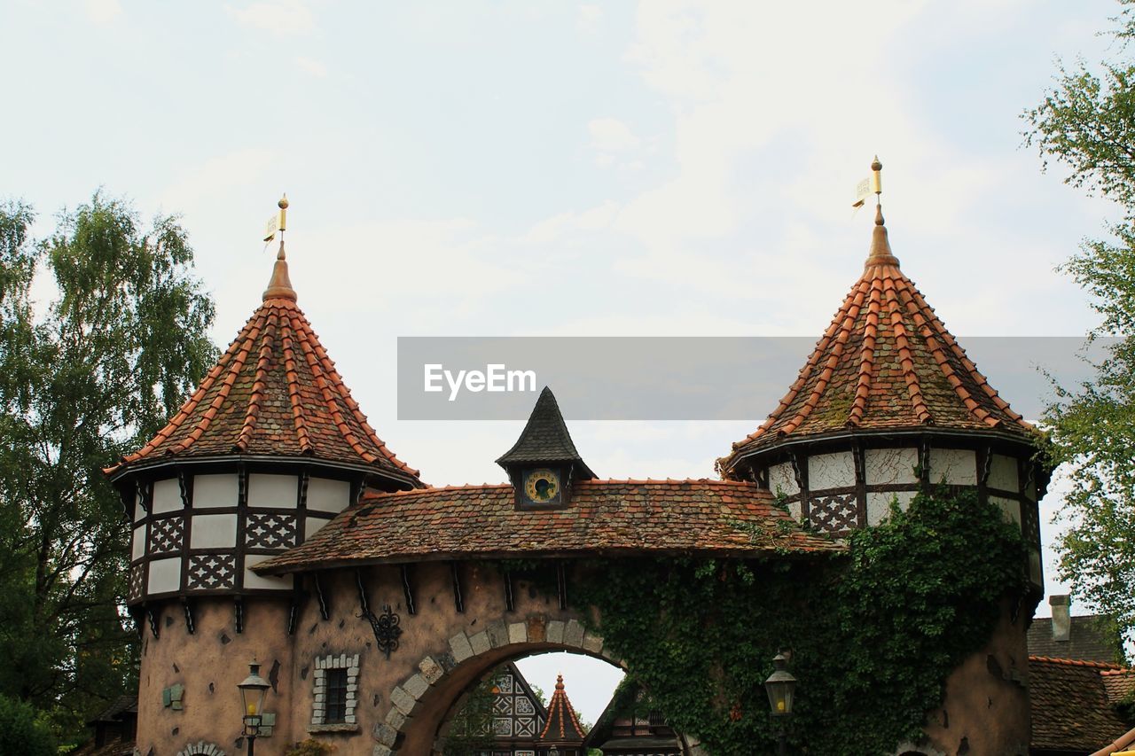 Exterior of heide park against cloudy sky