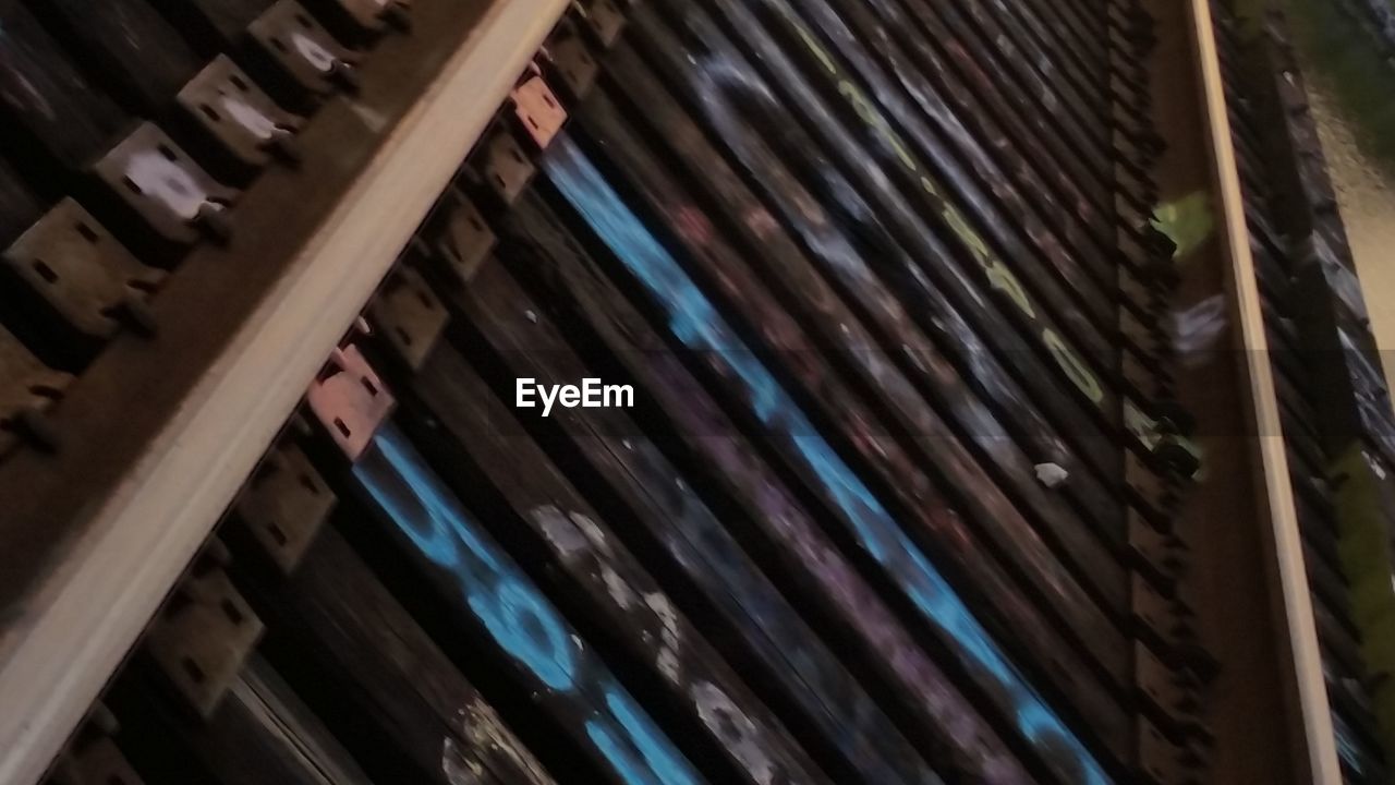 LOW ANGLE VIEW OF BUILDING SEEN THROUGH BLINDS