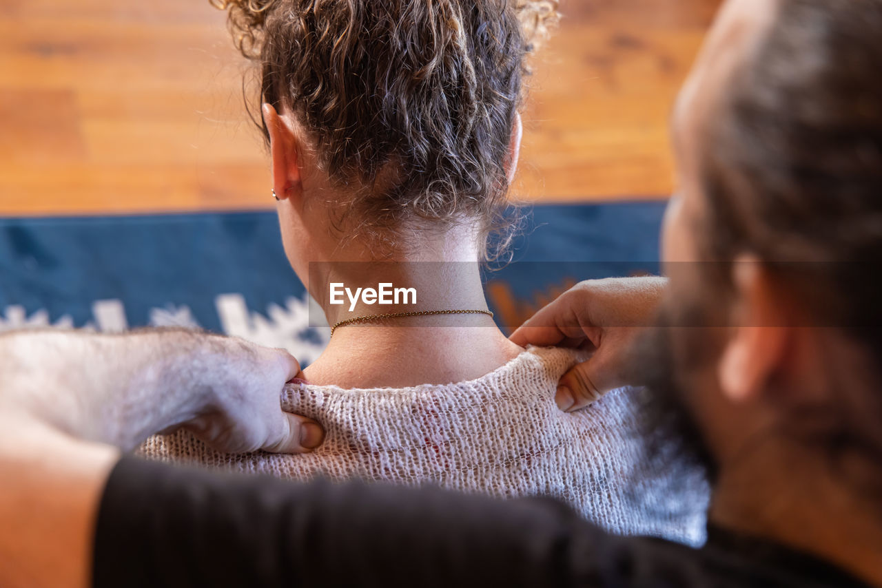 side view of boy lying at home