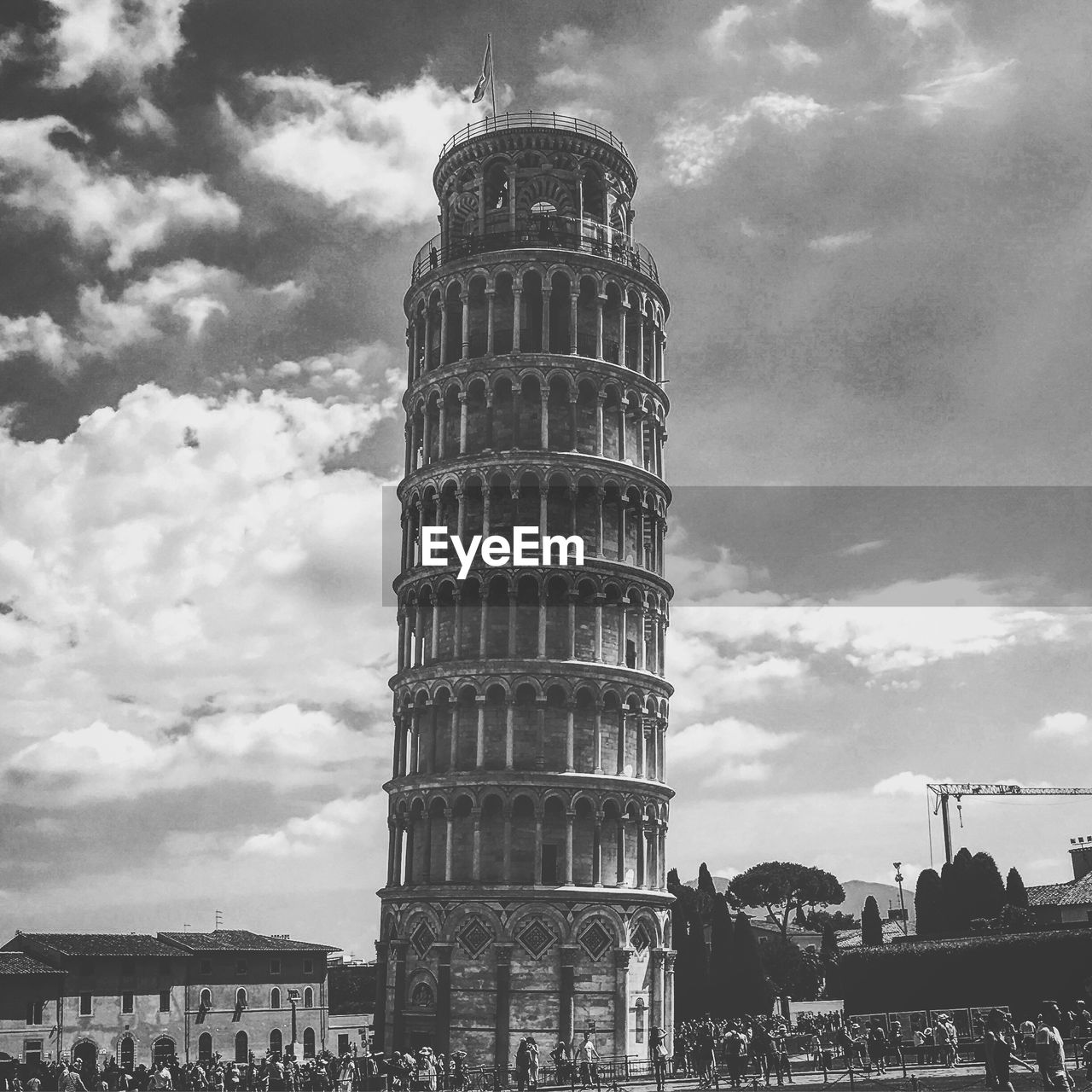 LOW ANGLE VIEW OF LEANING TOWER OF LIBERTY AGAINST CLOUDY SKY