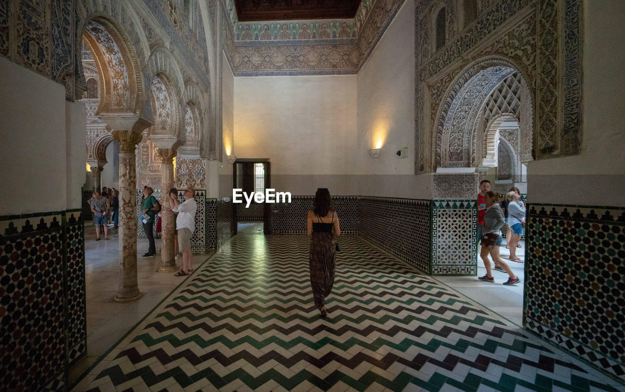 Royal Alcázar of Seville - Landmark Moorish royal palace with fountain-filled gardens, ornate arches & 16th-century tiles. Seville Seville,spain SPAIN Alcazar De Seville Alcazar Alcázar De Sevilla Royal Moorish Moorish Architecture Landmark Ornate Digital Nomad Freeze Pose Travel EyeEmNewHere Garden History Indoors  Adult Group Of People Architecture Built Structure Religion Place Of Worship Belief Spirituality Architectural Column Building