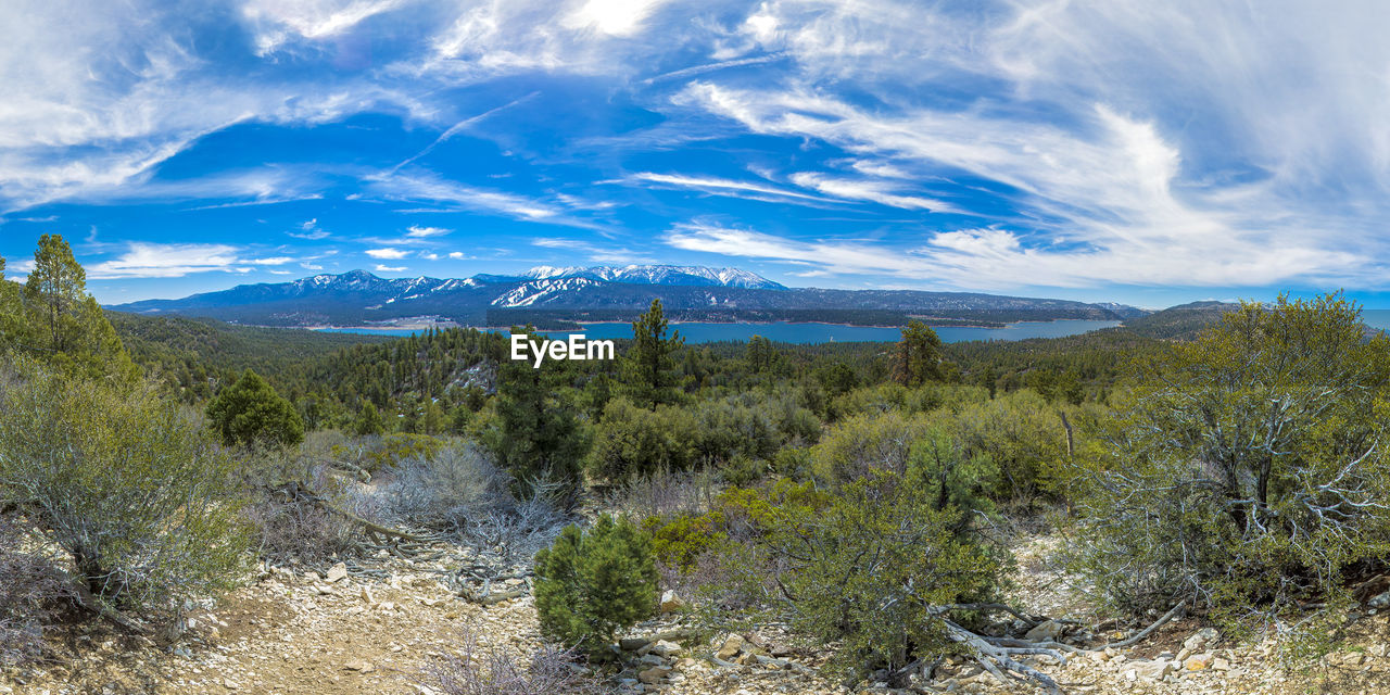 SCENIC VIEW OF LANDSCAPE AND MOUNTAINS AGAINST SKY