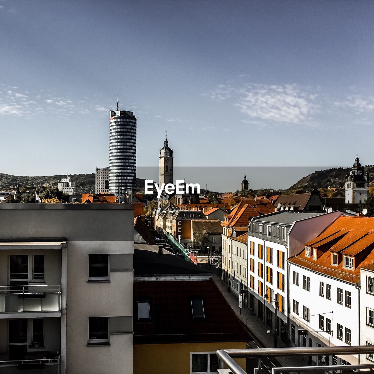 Buildings in city against sky