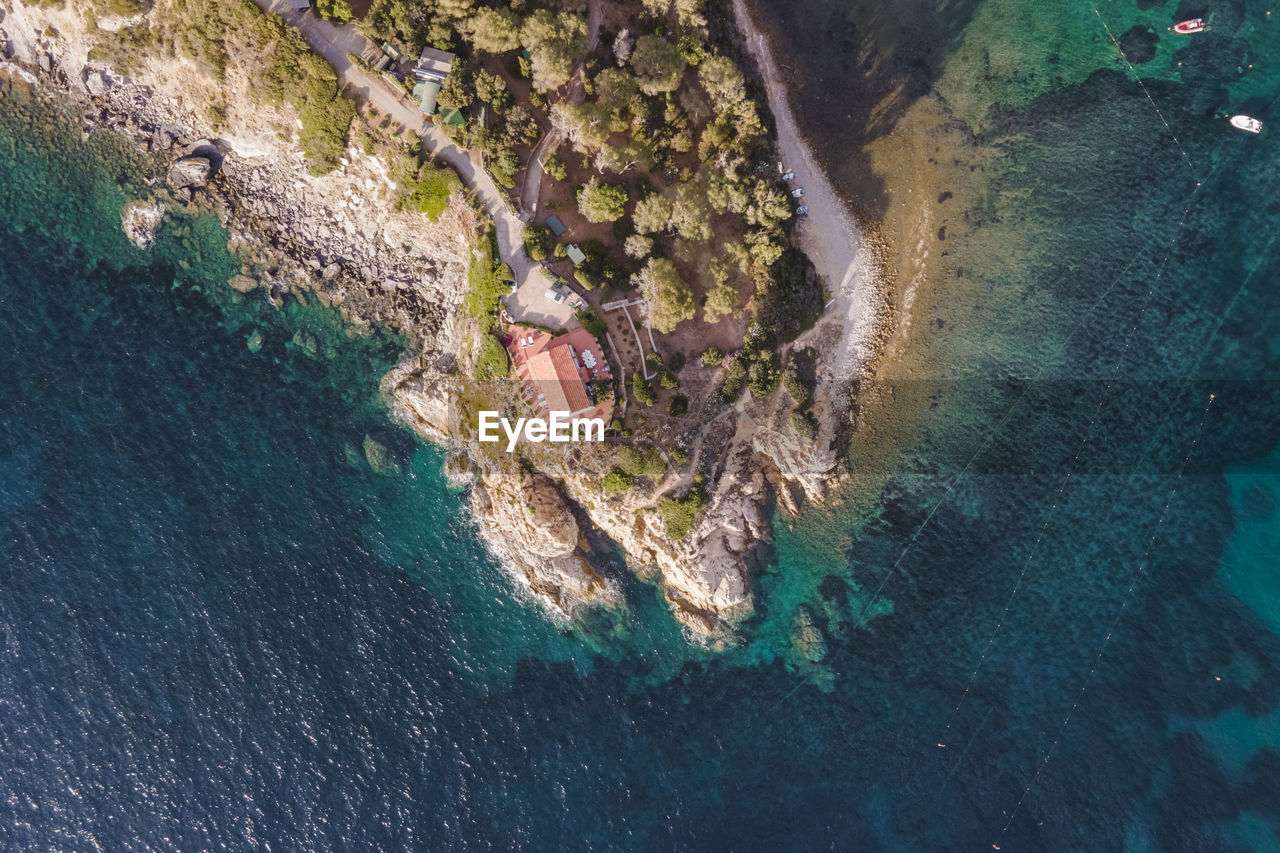 water, sea, aerial view, high angle view, nature, aerial photography, terrain, land, beauty in nature, cliff, scenics - nature, day, no people, coast, beach, outdoors, environment, tranquility, travel destinations, travel, blue, turquoise colored, rock, coastline, landscape, ocean, tranquil scene