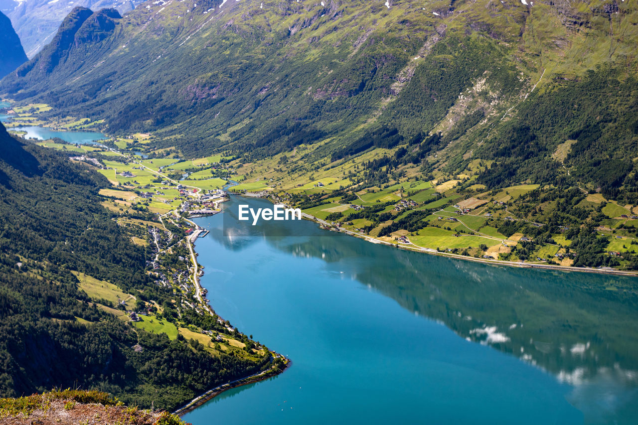 Scenic view of lake amidst mountains