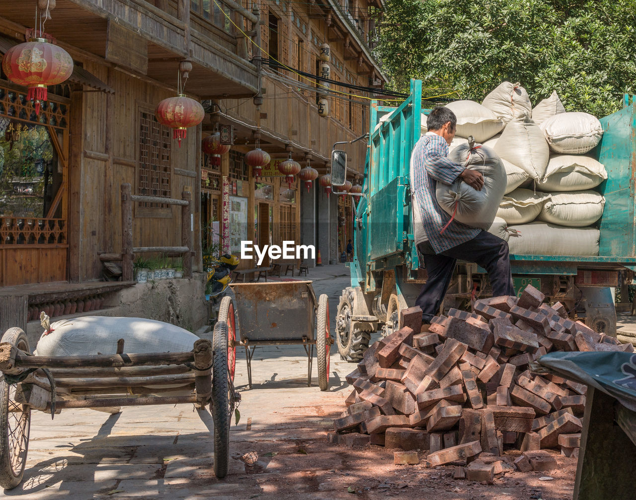 MAN WORKING STATUE