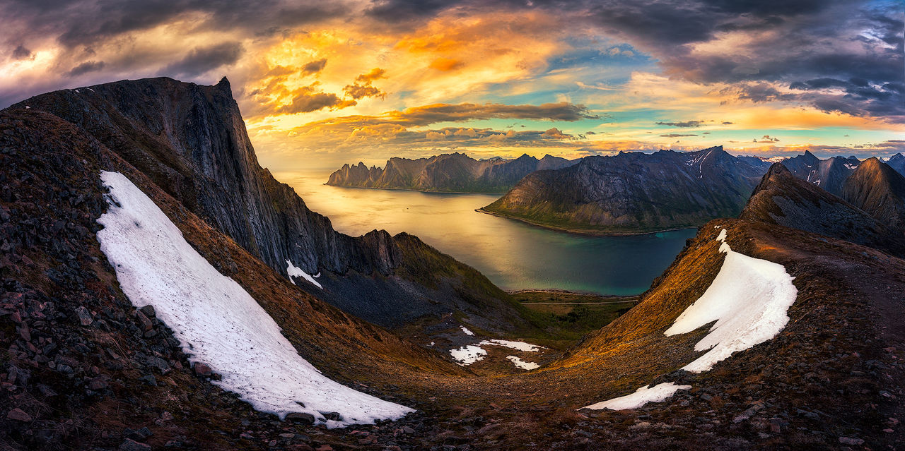 Panoramic view of mountains against sky during sunset