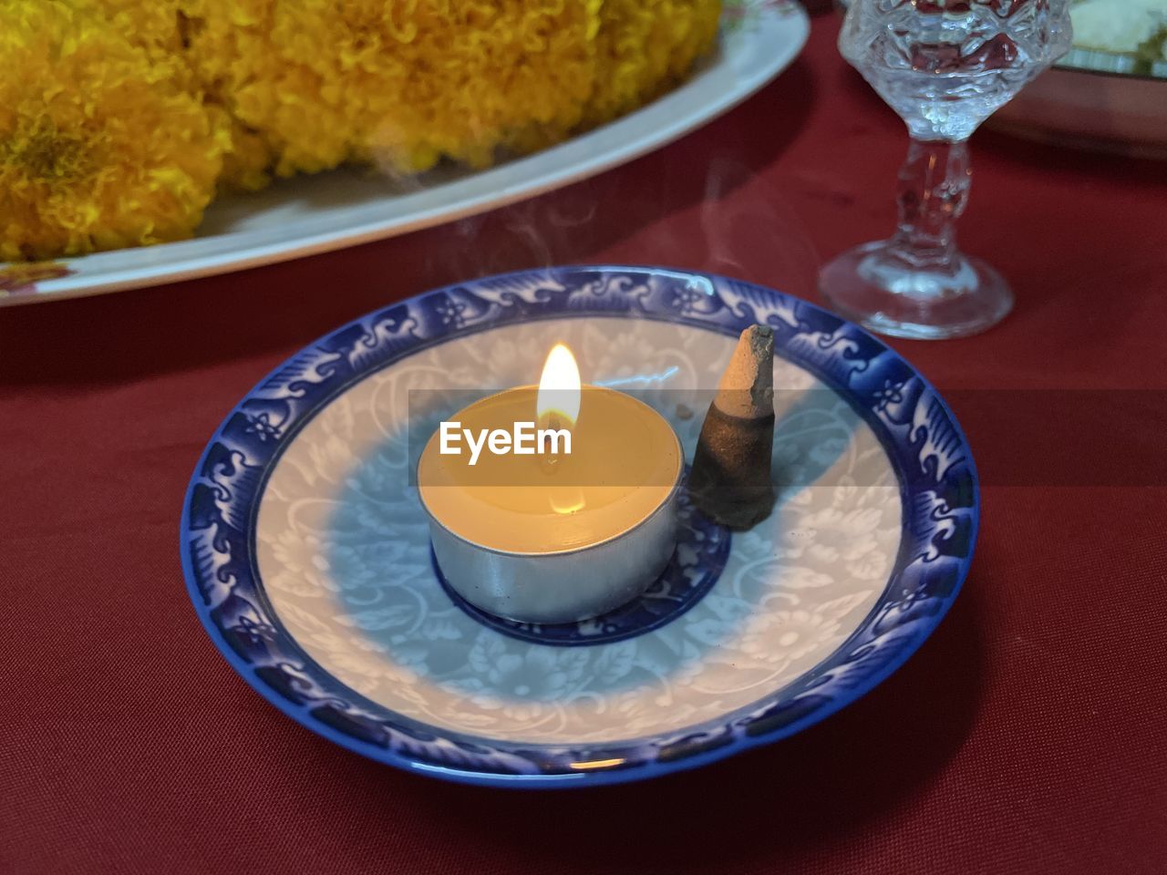 candle, burning, flame, fire, plate, food and drink, nature, table, food, no people, heat, meal, indoors, glass, celebration, religion, dish, close-up, tradition, spirituality, crockery, wellbeing, high angle view, decoration, household equipment