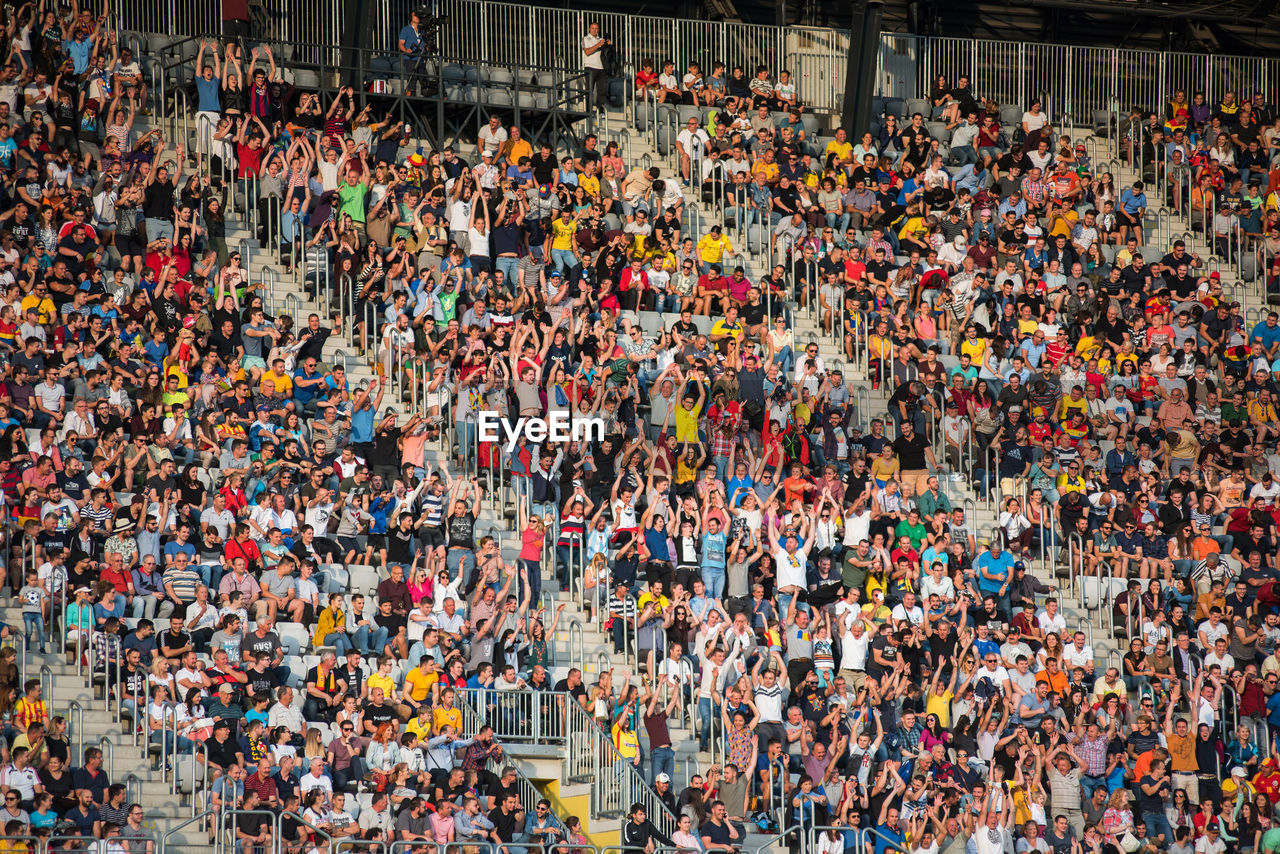 High angle view of people sitting in stadium