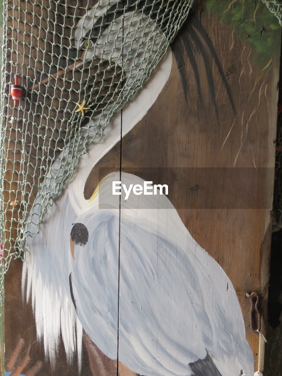 Heron painting on door