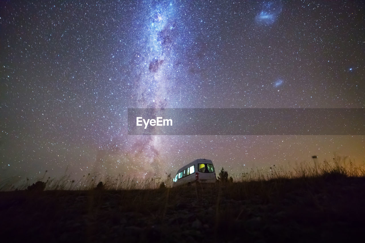 Low angle view of star field against sky at night