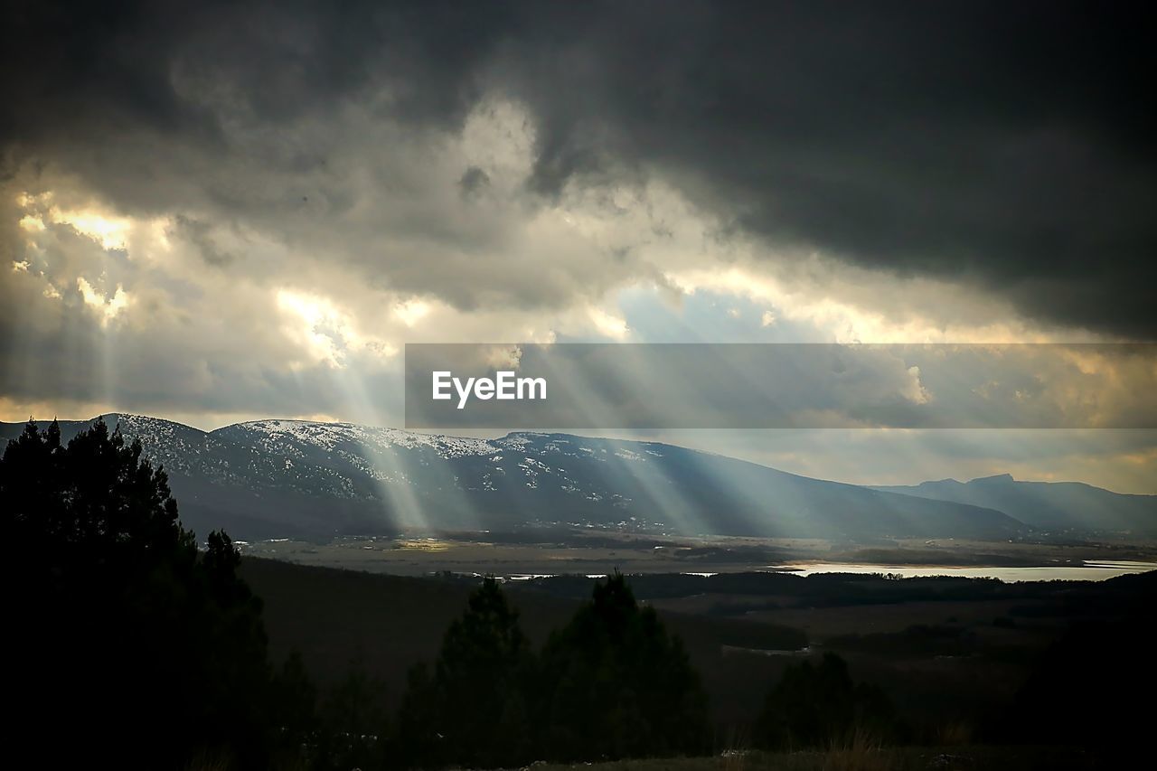 PANORAMIC SHOT OF STORM CLOUDS OVER WATER