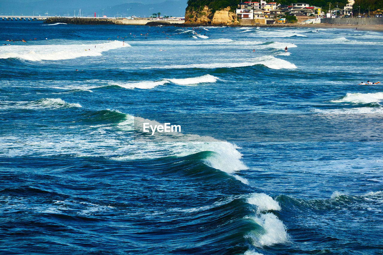 Scenic view of sea with rushing waves