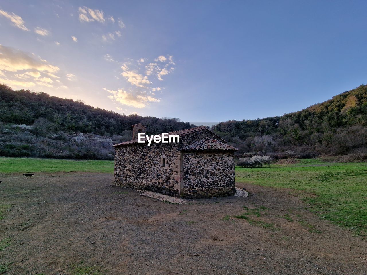 sky, rural area, landscape, architecture, nature, hill, environment, plant, land, no people, scenics - nature, built structure, grass, rock, cloud, tree, building, rural scene, travel destinations, history, outdoors, house, travel, building exterior, ruins, tranquility, beauty in nature, the past, field