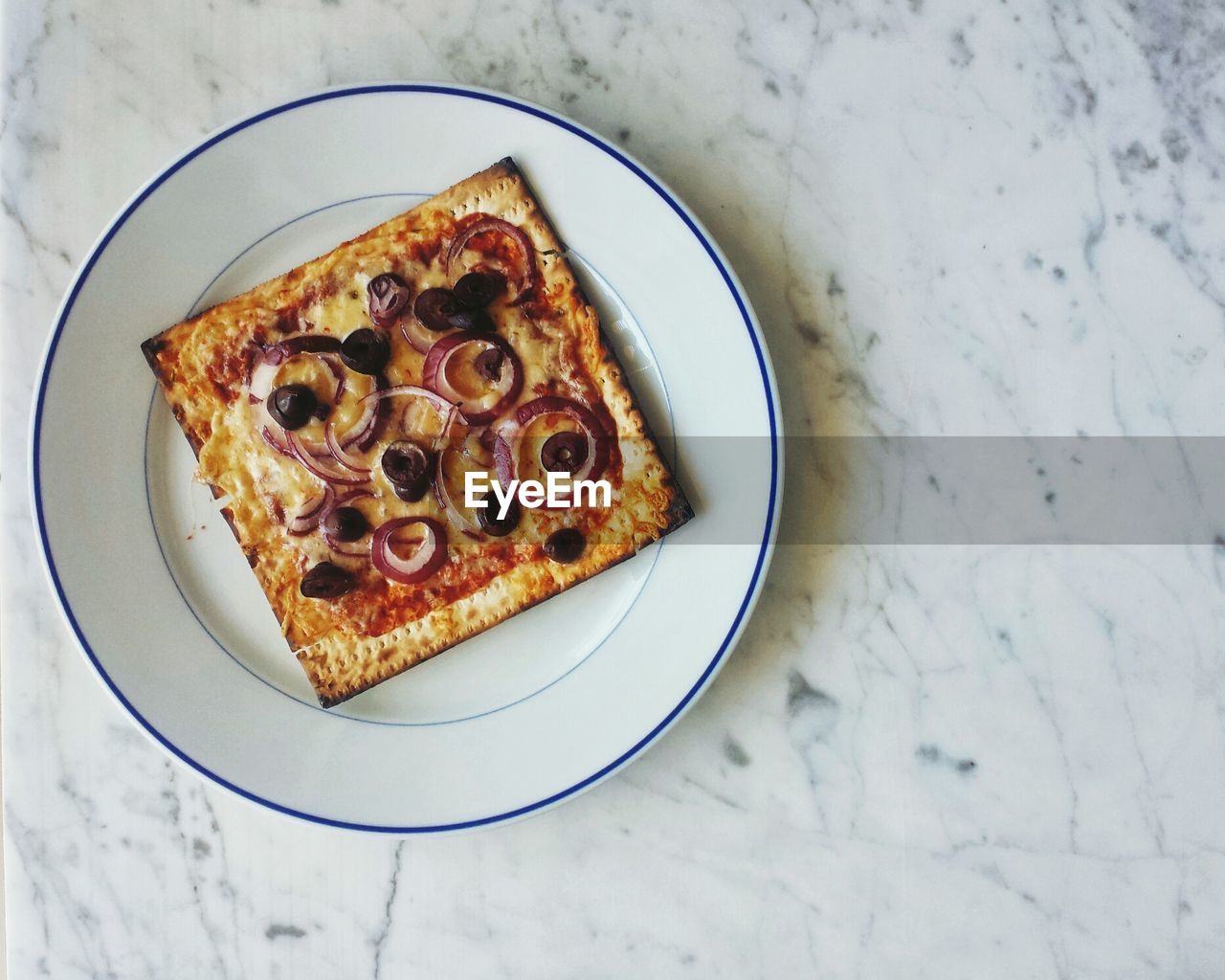 Close-up of pizza served in plate