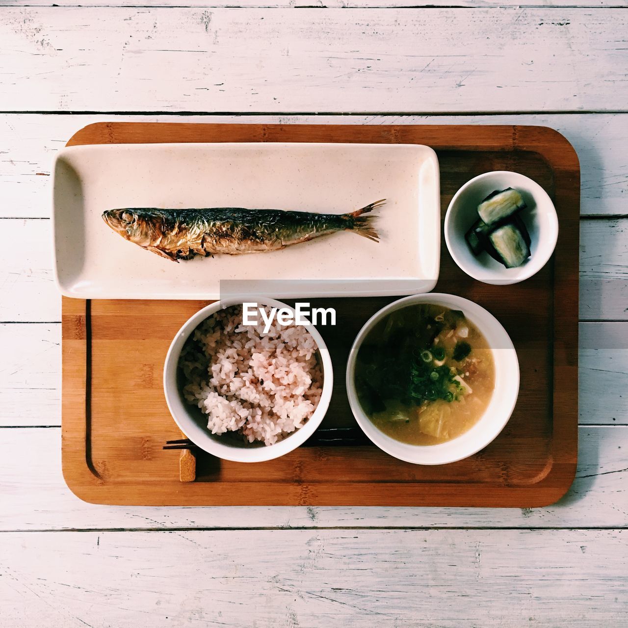 Directly above shot of food in tray on wooden table