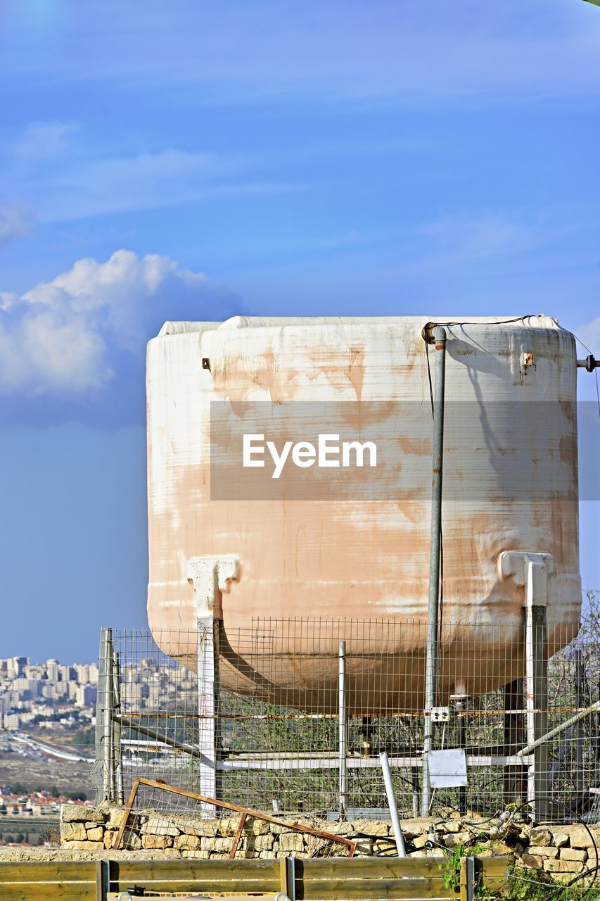 sky, industry, architecture, nature, cloud, built structure, day, power generation, stadium, factory, power station, outdoors, building exterior, no people, storage tank, silo, sport venue, metal