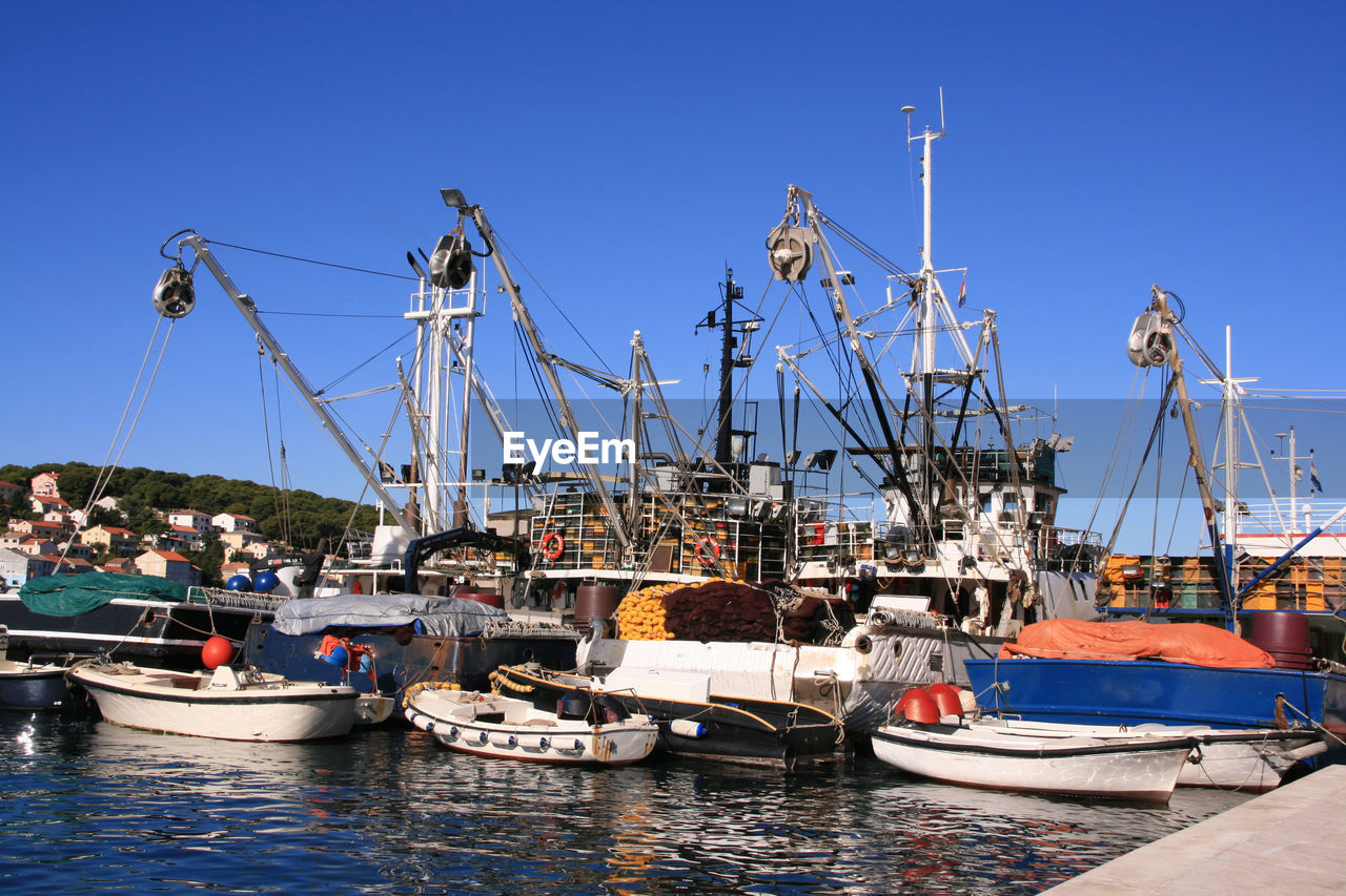 FISHING BOATS IN HARBOR