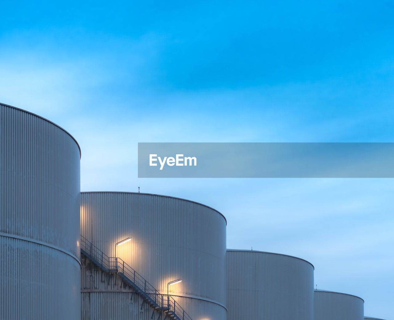 LOW ANGLE VIEW OF SMOKE STACK AGAINST SKY