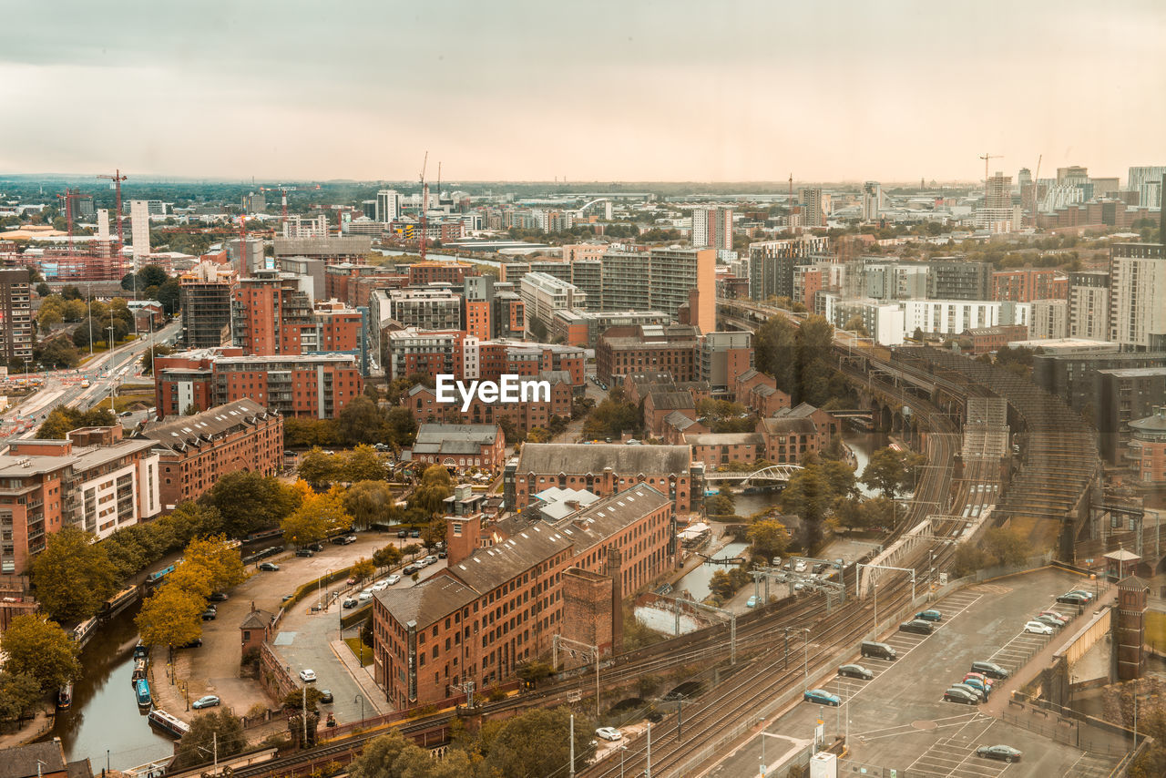 High angle view of street amidst buildings in city