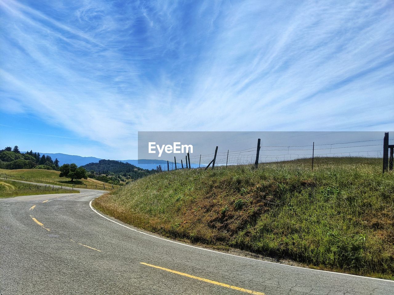 ROAD PASSING THROUGH LANDSCAPE