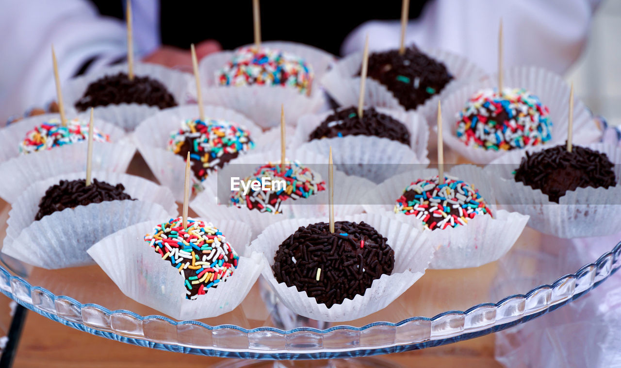 Homemade chocolate balls coated with sprinkles