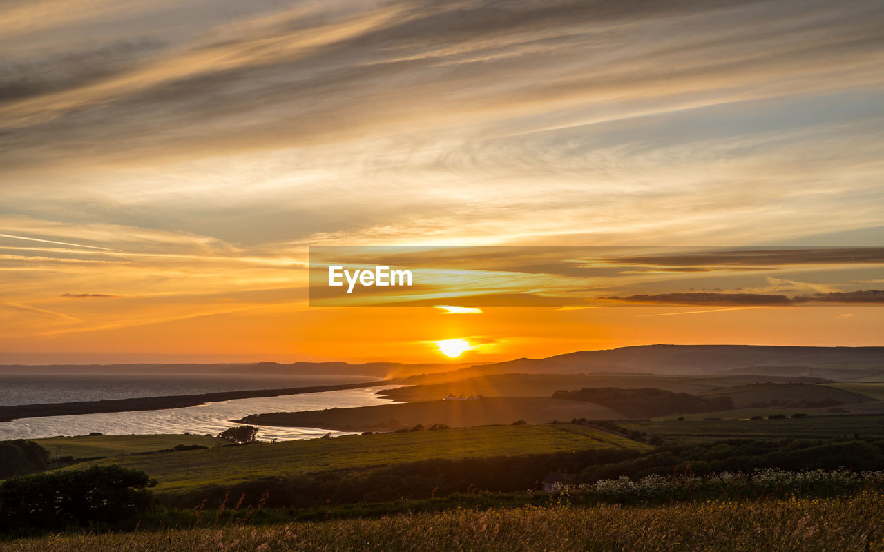 Sunset at sea barn farm, fleet, weymouth, uk