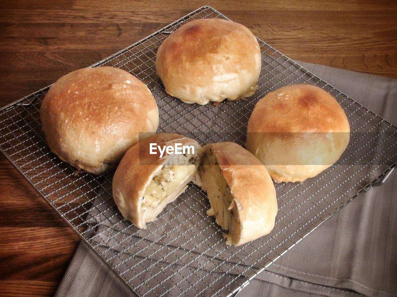 food, food and drink, freshness, bread, baked, fast food, bread roll, no people, indoors, high angle view, still life, wood, table, healthy eating, bun, wellbeing, brioche, ciabatta, dish, close-up, dessert, cuisine, meal