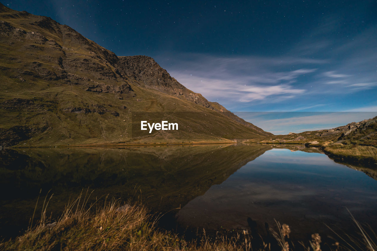 Alpine lake at night