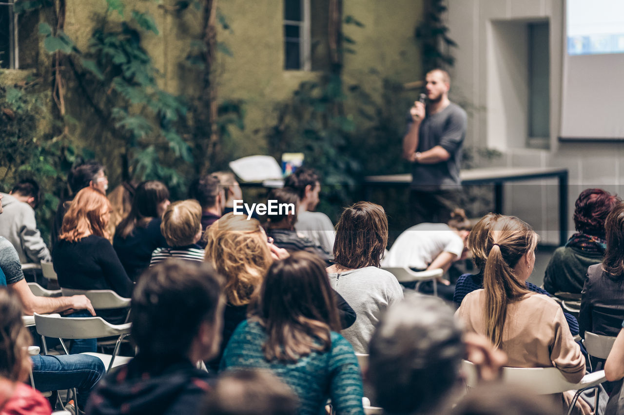 crowd, group of people, large group of people, social group, adult, men, women, architecture, audience, young adult, communication, city, event, togetherness, talking