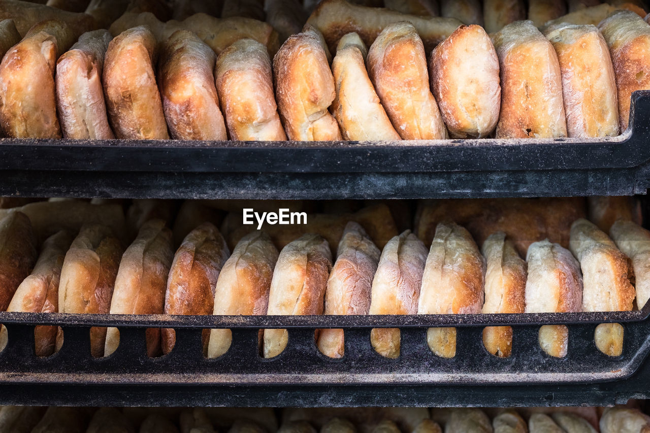 Breads on shelf in bakery for sale