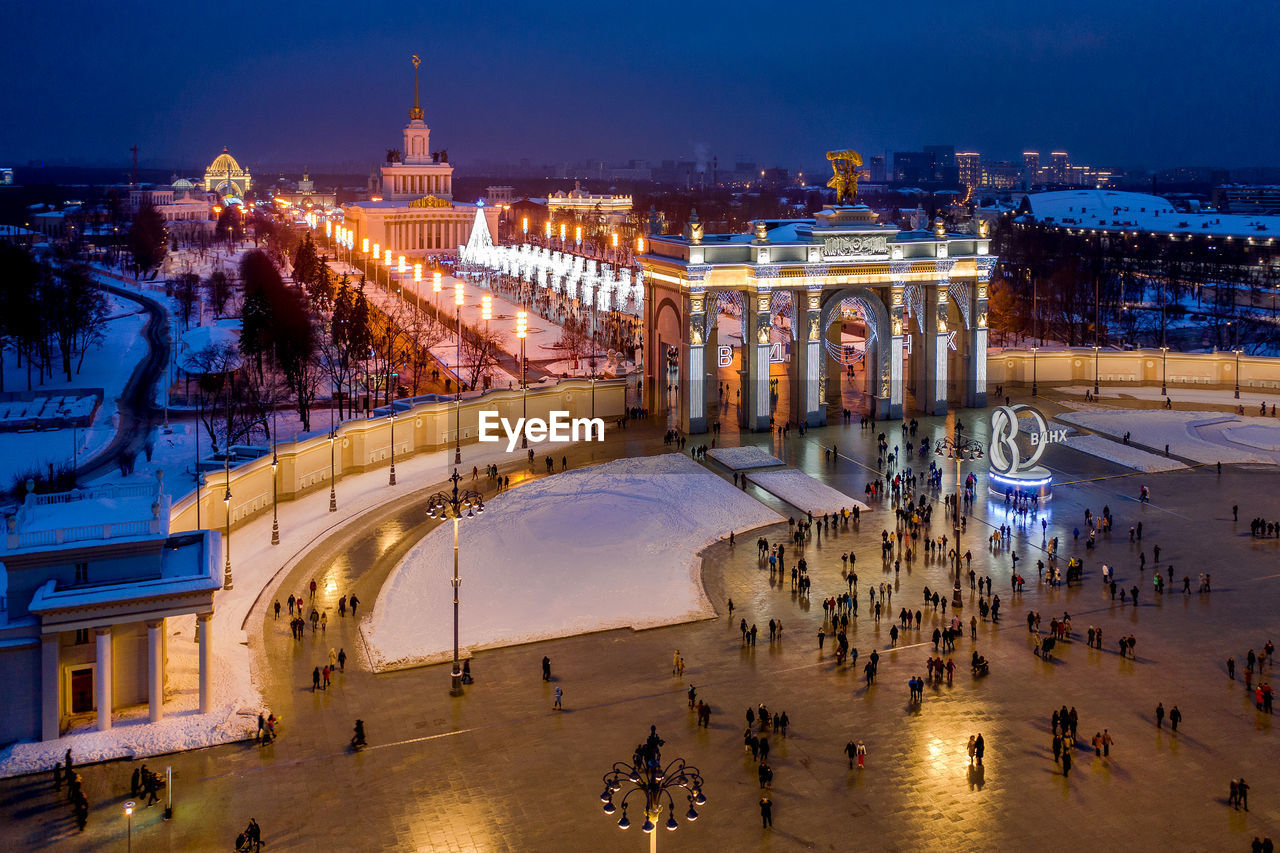 HIGH ANGLE VIEW OF CITY BUILDINGS AT NIGHT