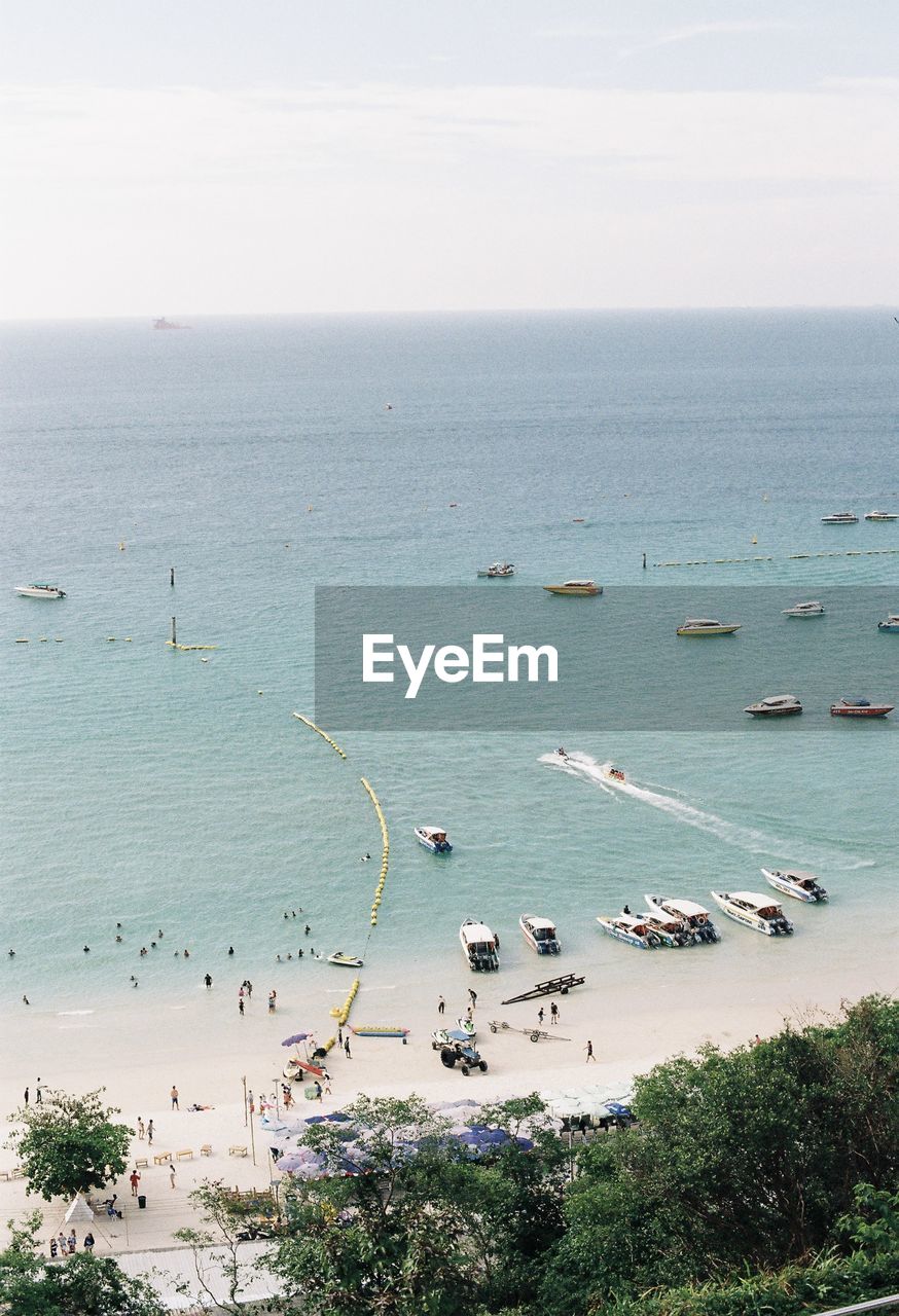 water, sea, shore, coast, nautical vessel, land, transportation, body of water, sky, beach, nature, horizon over water, beauty in nature, mode of transportation, scenics - nature, ocean, day, horizon, bay, high angle view, travel, tranquility, no people, outdoors, plant, travel destinations, tranquil scene, tree, vacation, architecture, holiday, idyllic, tourism, trip, coastline
